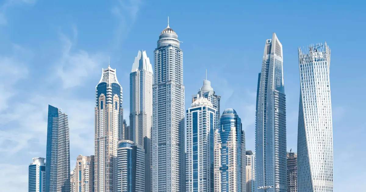Modern city skyline in day time with tall buildings and clear sky